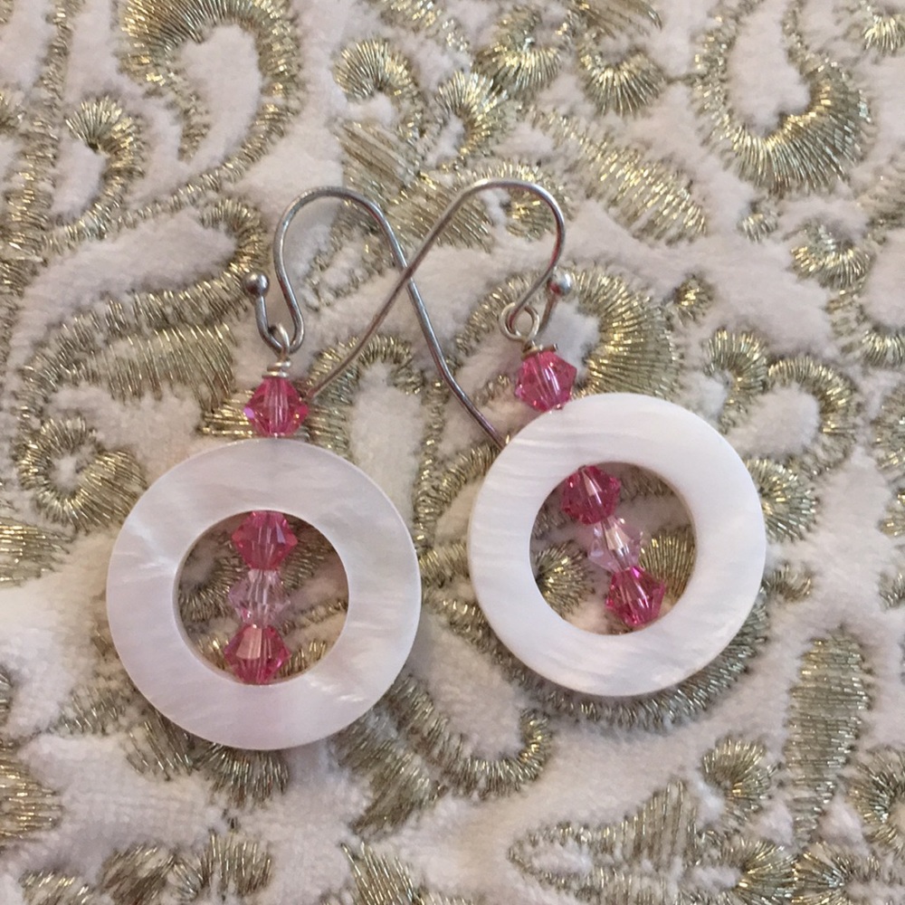 Swarovski crystals And MOP silver earrings.